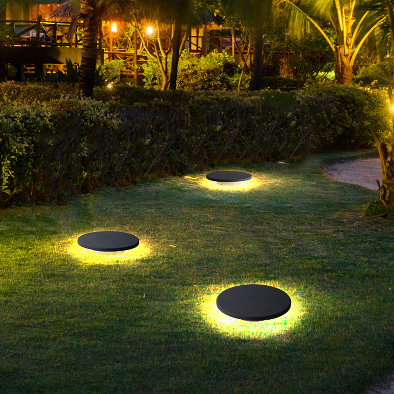 GARDEN LIGHTING IN THE FORM OF A BLACK STONE