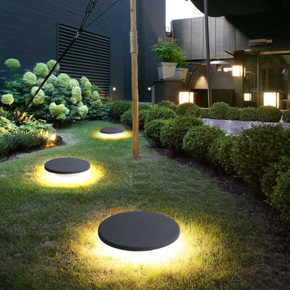 GARDEN LIGHTING IN THE FORM OF A BLACK STONE