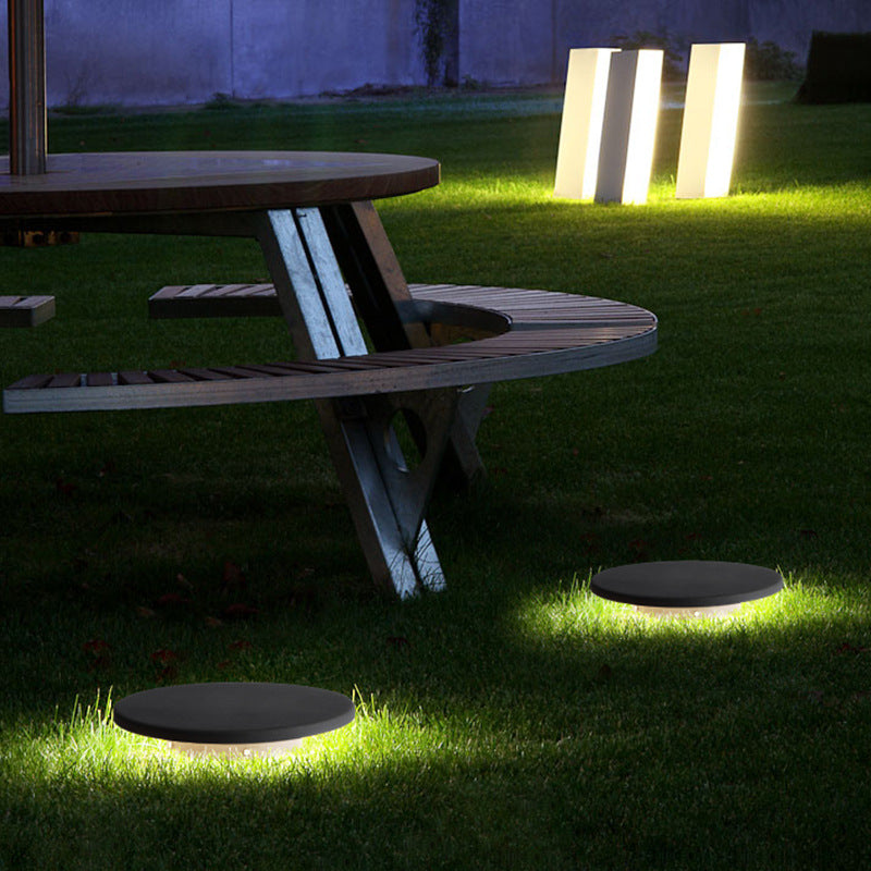 GARDEN LIGHTING IN THE FORM OF A BLACK STONE