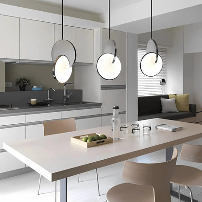 Coin pendant light